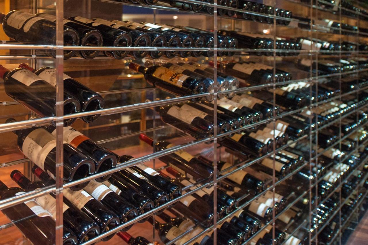 Grand Plaza Hotel & Wellness Andorra la Vella Dış mekan fotoğraf Wine bottles in a wine rack
